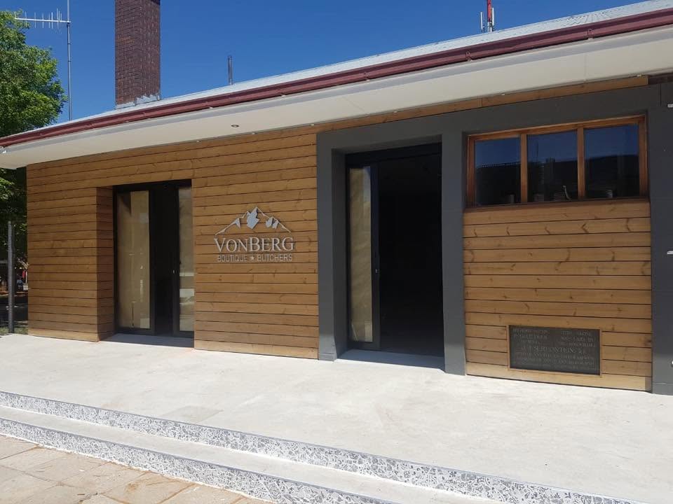 Exterior timber cladding with feature signage